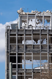 Low angle view of building against blue sky