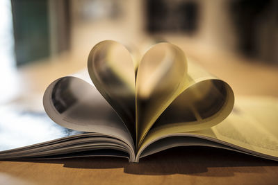 Close-up of folded pages in book
