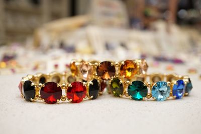 Close-up of colorful bangles on table