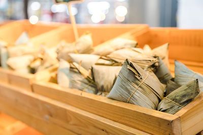 Close-up of food wrapped in leaf on table