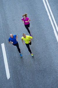 Three runners on road, stockholm, sweden