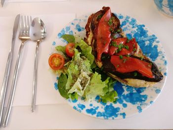 High angle view of vegetables in plate on table