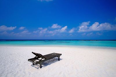 Sun lounger on calm beach