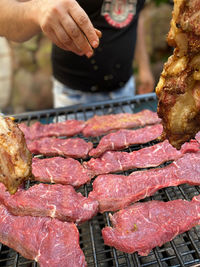 Close-up of meat on barbecue grill. prepareing steak for bbq party