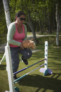 Woman participating in hobby horse competition