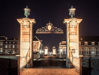 Illuminated buildings in city at night