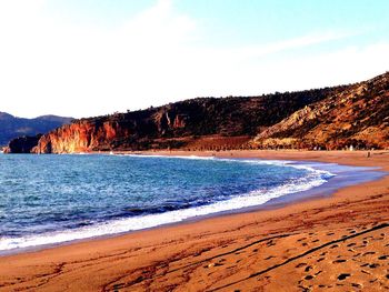 Scenic view of beach against sky