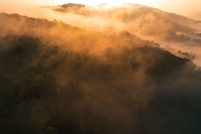 Scenic view of mountains against sky during sunset