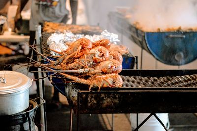 Close-up of prawn on grill