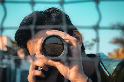 Close-up of hand holding camera