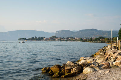 Scenic view of bay against sky