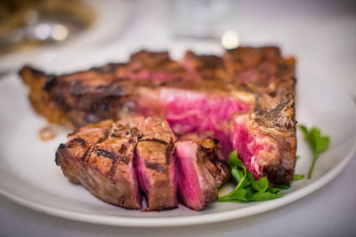 Close-up of meat in plate on table
