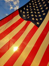 Low angle view of flag against sky