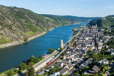 High angle view of river by city against sky