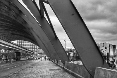 Bridge against sky in city