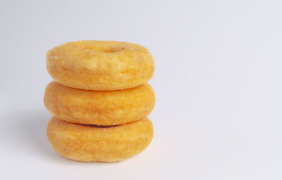 Close-up of donuts against white background