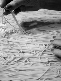 Close-up of man working on wood