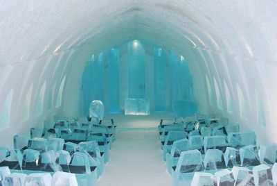 High angle view of empty ice chairs in ice chapel