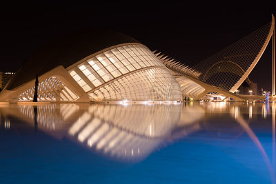 Illuminated modern building in city at night