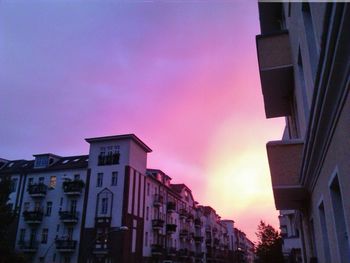 Low angle view of building at sunset