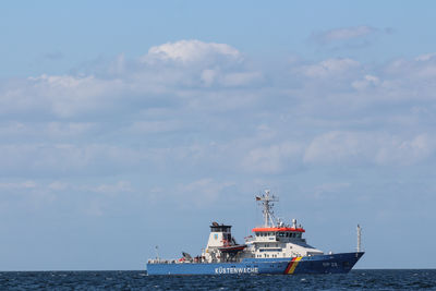 Ship in sea against sky