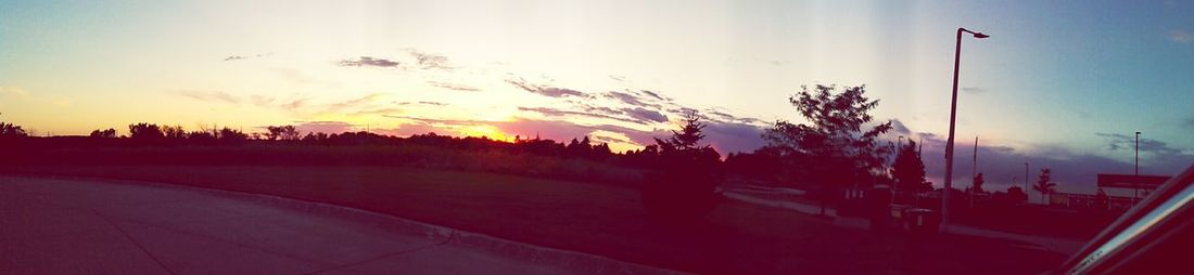 Silhouette of road at sunset