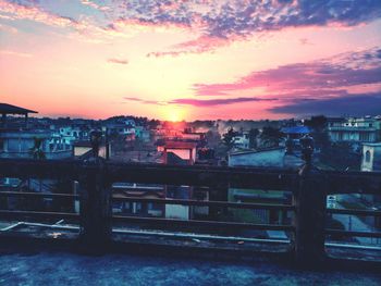 View of cityscape against sky during sunset