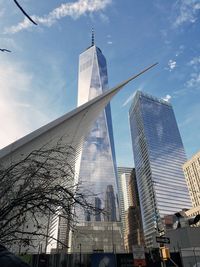 Low angle view of skyscrapers against sky