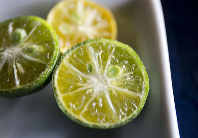 Close-up of lemon slice on table