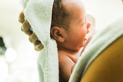 Close-up of mother holding baby