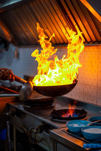 Close-up of fire on barbecue grill