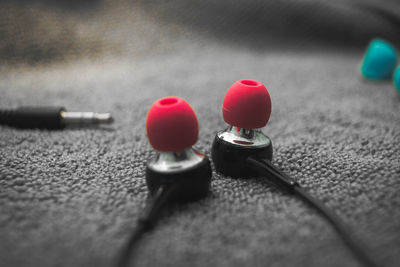 High angle view of red ball on rug