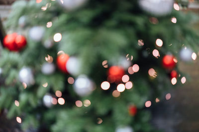 Defocused image of illuminated christmas tree