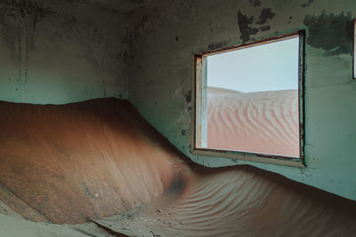 Close-up of window against wall at home