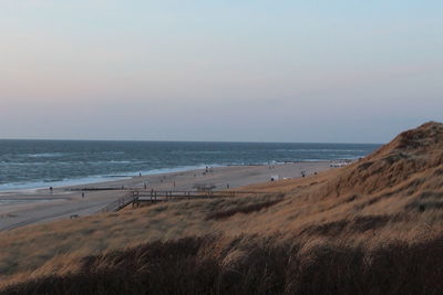 Scenic view of beach against clear sky