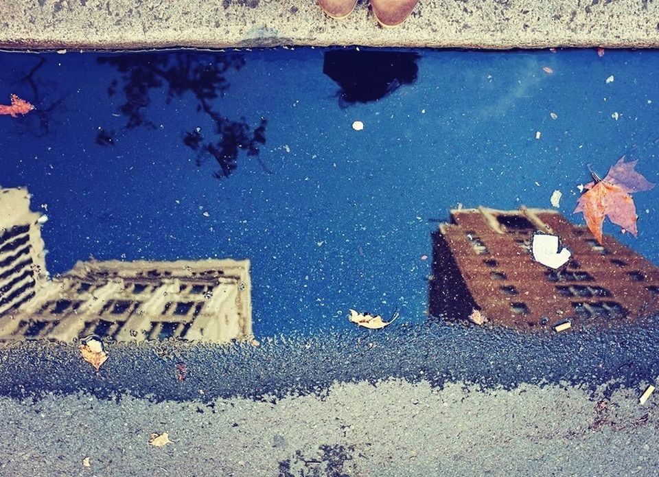 architecture, built structure, building exterior, puddle, wall - building feature, high angle view, damaged, weathered, deterioration, abandoned, window, old, day, street, outdoors, obsolete, building, run-down, no people, bad condition