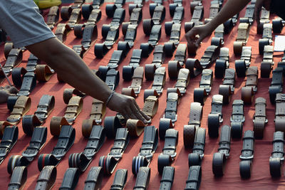 Close-up of belts for sale