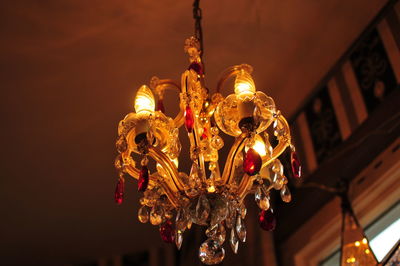 Low angle view of illuminated chandelier