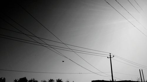 Low angle view of electricity pylon