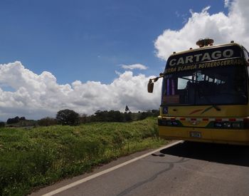 View of road against cloudy sky