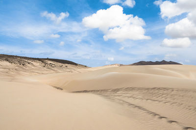 Scenic view of desert against sky