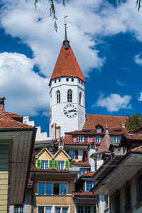 Low angle view of houses against sky