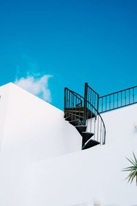 Low angle view of stairs against sky