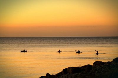 Scenic view of sea at sunset