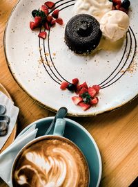 High angle view of cake served on table