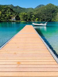 Scenic view of swimming pool by lake