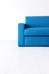 Empty sofa against white background