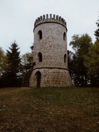 Low angle view of old building against sky