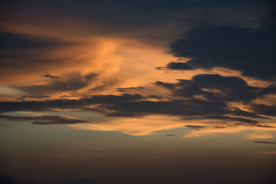 Beautiful, stunning golden sky during sunset at promthep cape landmark viewpoint in phuket, thailand