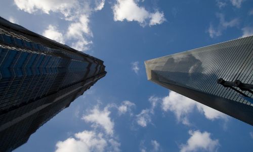 Low angle view of modern buildings against sky